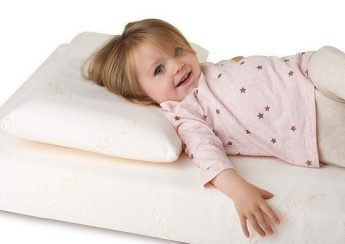 Trẻ em nằm đệm bông ép được không